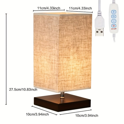 A Compact Table Lamp for The Bedroom, Featuring a Straightforward Design with a Square Fabric Shade. This Desk Lamp Is Suitable for Reading And Can Be Used in Bedrooms, Living Rooms, Offices